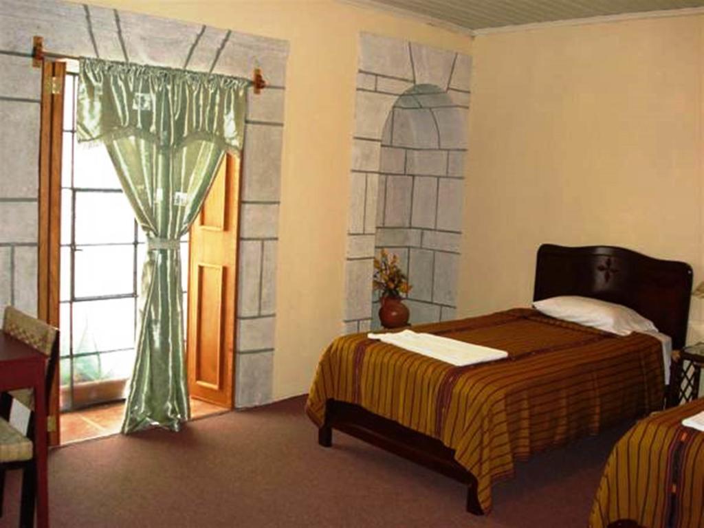 Hostal Casa Dona Mercedes Quetzaltenango Habitación foto